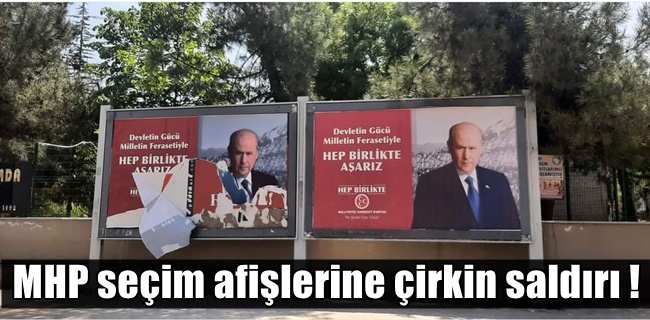 MHP seçim afişlerine çirkin saldırı !